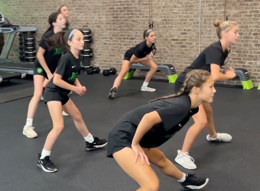 LSC Elite Training Youth Girls in a group exercise space near Kentucky